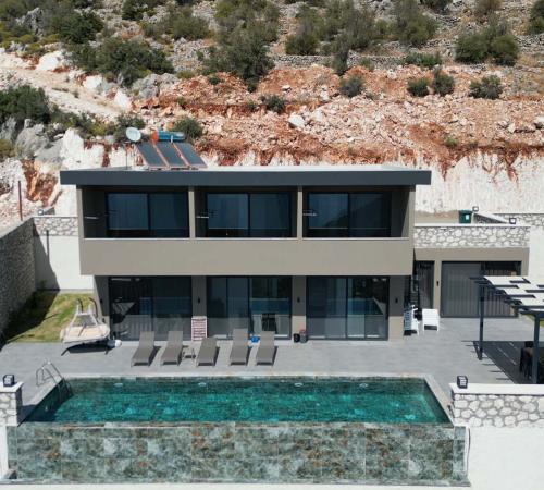 Villa Güneş Duo, Kalkan'da 4 Odalı Deniz Manzaralı Kiralık Villa - Birebirvilla