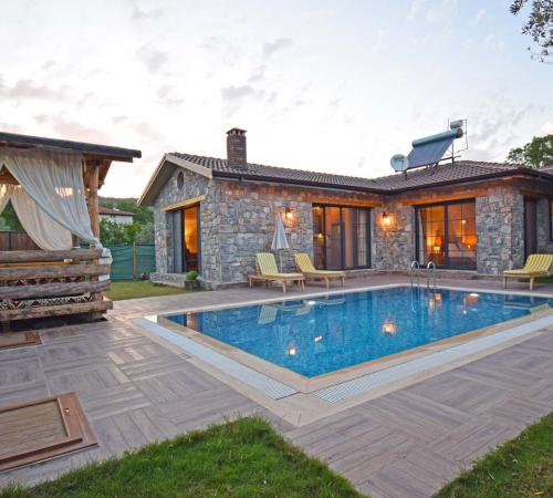 Sizde tatilinizi kiralık villalarda geçirin yazın tadını çıkarın. - Birebirvilla