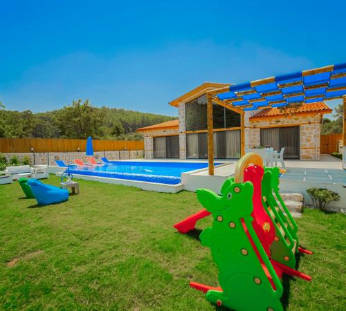 Villa Emir Duo, Kalkan Patara'da 2 Odalı Jakuzili Muhafazakar Kiralık Villa - Birebirvilla