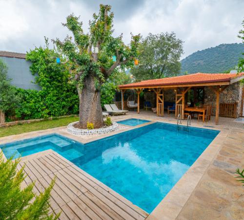 Villa Jolly  Fethiye, Kayaköy'de 4 Kişilik Havuzu Korunaklı Villa - Birebirvilla
