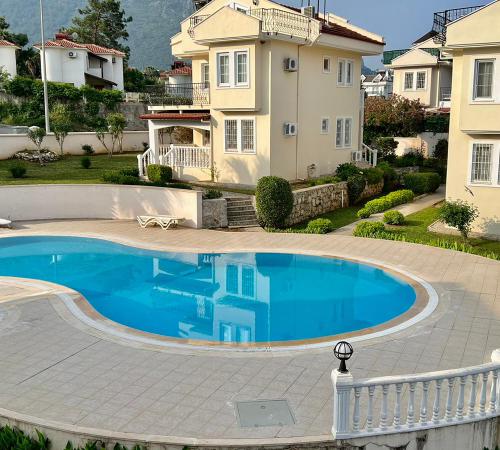Villa Oyalı, Fethiye, Ovacık'da 3 Odalı Ortak Havuzlu Villa - Birebirvilla