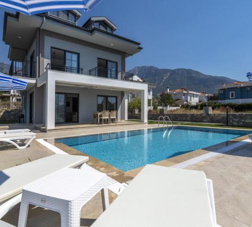 Villa Sakura 2, Fethiye Ovacık'da 4 Odalı 8 Kişilik Kiralık Villa - Birebirvilla